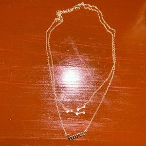 Gold taurus necklace